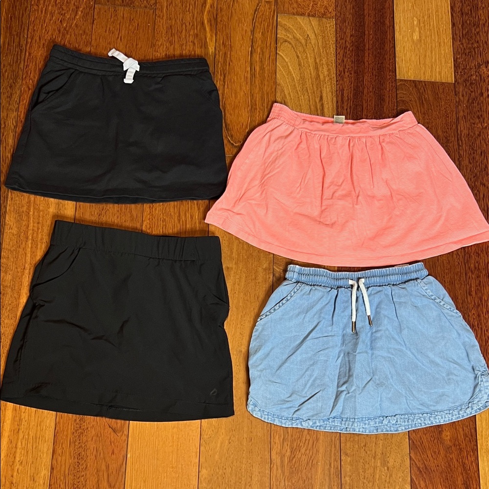 4 skorts Black and Pink  and blue size 10 years old